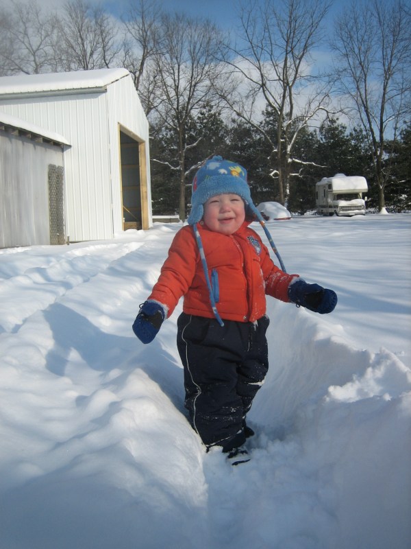 Joe Robert modeling his winter wear at home in Indiana